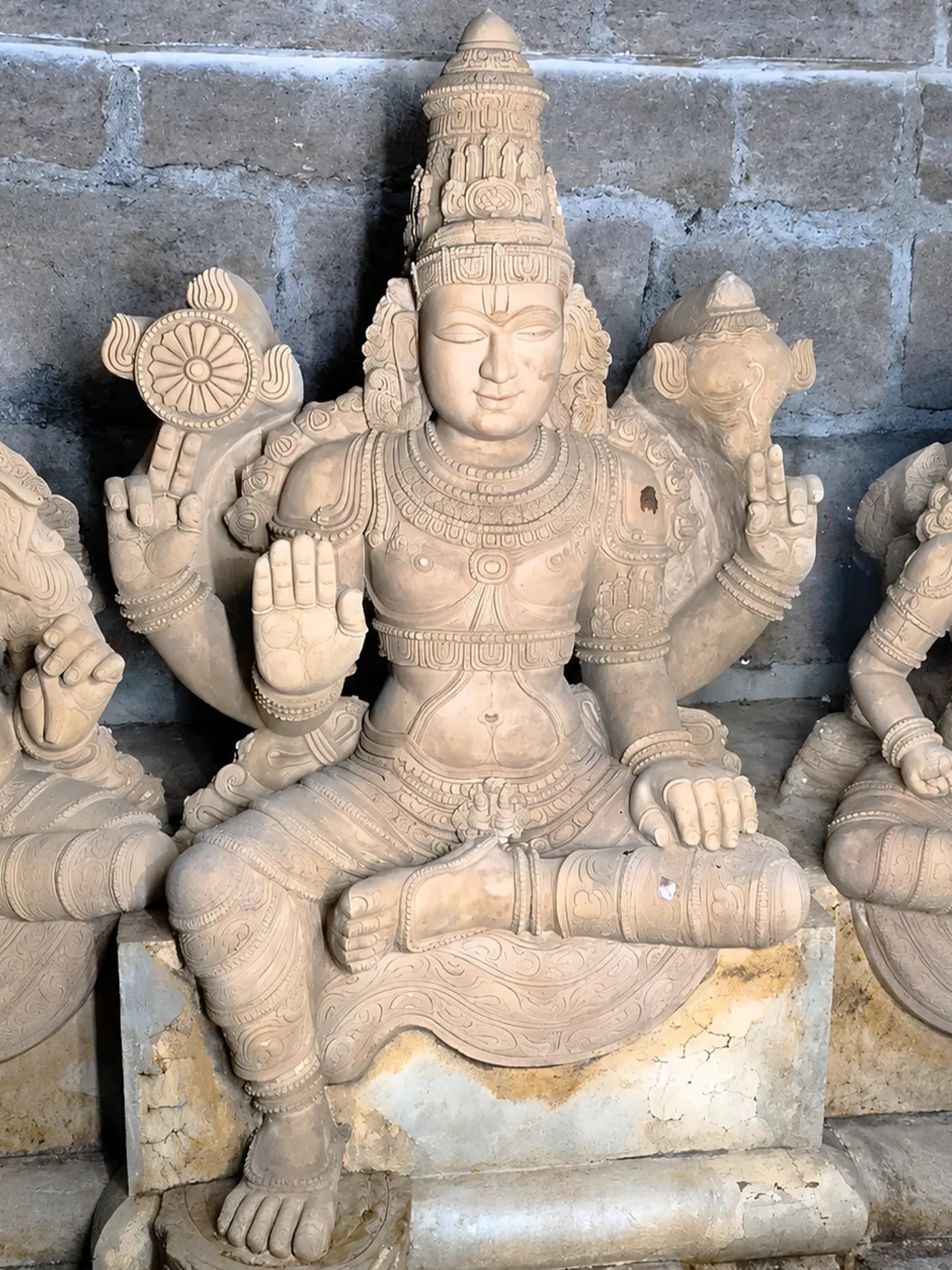 Sacred stone deity sculpture crafted using traditional Agama principles